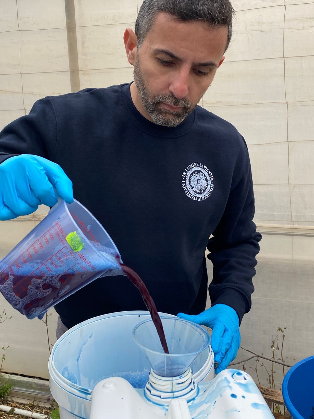 Filtering a batch of extract by hand at the pilot